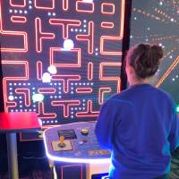 Alumni playing Pac-Man